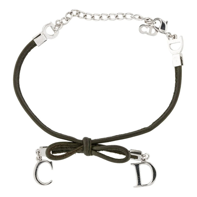 Dior bow tie choker necklace in black and silver C on one end of the necklace D on the other end of the bow tie knot with silver fastener
