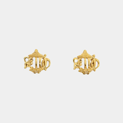 Backside clip closure of Christian Dior clip earrings in the shape of the original intricate monogram design.